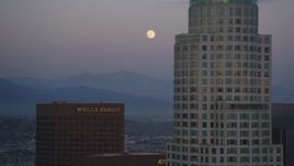 5K aerial stock footage of full moon and skyscrapers in Downtown Los Angeles at twilight, California Aerial Stock Footage | DCLA_073