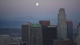 5K aerial stock footage full moon seen while flying by Downtown Los Angeles at twilight, California Aerial Stock Footage | DCLA_074