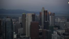 5K aerial stock footage pass The Ritz-Carlton to reveal towers in Downtown Los Angeles at twilight, California Aerial Stock Footage | DCLA_079