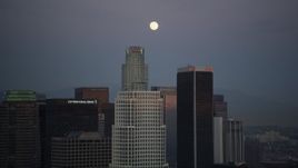 5K aerial stock footage orbit The Ritz-Carlton to reveal Downtown Los Angeles towers and full moon at twilight, California Aerial Stock Footage | DCLA_080