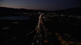 5K aerial stock footage fly over light traffic on Interstate 5 interchange in Sylmar at night, California Aerial Stock Footage | DCLA_090