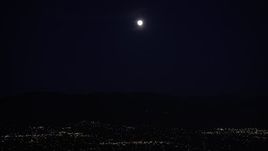 5K aerial stock footage of full moon over San Fernando Valley at night, California Aerial Stock Footage | DCLA_093