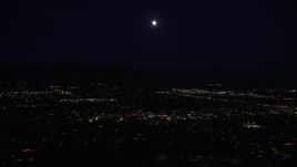 5K aerial stock footage of full moon over suburban neighborhoods in the San Fernando Valley at night, California Aerial Stock Footage | DCLA_094