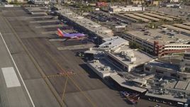 5K aerial stock footage fly low over runway and approach terminals at Burbank Airport, California Aerial Stock Footage | DCLA_105