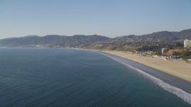 5K aerial stock footage fly over the ocean near the beach in Santa Monica, California Aerial Stock Footage | DCLA_130