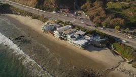 5K aerial stock footage approach beachfront homes and Highway 1 in Malibu, California Aerial Stock Footage | DCLA_161