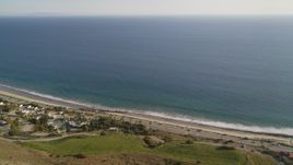 5K aerial stock footage fly over mountain to reveal and approach Highway 1 in Malibu, California Aerial Stock Footage | DCLA_163