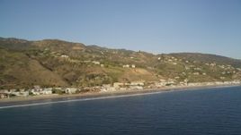 5K aerial stock footage pan across homes on the coast of Malibu, California Aerial Stock Footage | DCLA_174