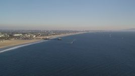 5K aerial stock footage of slow approach to Santa Monica Pier and the beach in California Aerial Stock Footage | DCLA_179