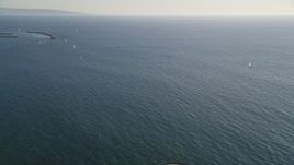 5K aerial stock footage of sailboats seen from Venice Fishing Pier in California Aerial Stock Footage | DCLA_185