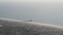 5K aerial stock footage of Manhattan Beach Pier on the coast in Manhattan Beach, California Aerial Stock Footage | DCLA_199