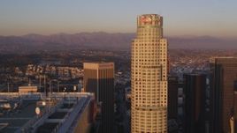 5K aerial stock footage tilt from Hope Street to approach Aon Center and US Bank Tower at sunset in Downtown Los Angeles, California Aerial Stock Footage | DCLA_213