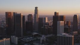 5K aerial stock footage tilt to reveal and approach Downtown Los Angeles and Bonaventure Hotel at sunset, California Aerial Stock Footage | DCLA_217