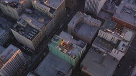 5K aerial stock footage bird's eye view of city streets and buildings in Downtown Los Angeles at sunset, California Aerial Stock Footage | DCLA_221