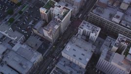 5K aerial stock footage of bird's eye of city streets and buildings in Downtown Los Angeles at sunset, California Aerial Stock Footage | DCLA_222
