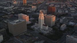 5K aerial stock footage approach Los Angeles City Hall in Downtown Los Angeles at sunset, California Aerial Stock Footage | DCLA_230