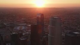 5K aerial stock footage fly between towers to reveal Staples Center and The Ritz-Carlton at sunset in Downtown Los Angeles, California Aerial Stock Footage | DCLA_235