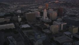 5K aerial stock footage flyby Deloitte & Touche toward city hall in Downtown Los Angeles at twilight, California Aerial Stock Footage | DCLA_240
