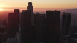 5K aerial stock footage of Downtown Los Angeles skyline with sunset on the horizon, California Aerial Stock Footage | DCLA_245