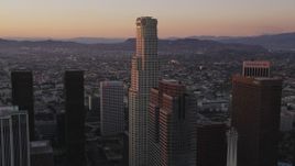5K aerial stock footage of US Bank Tower with skyscrapers in Downtown Los Angeles at sunset, California Aerial Stock Footage | DCLA_246