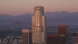 5K aerial stock footage reverse view of US Bank Tower at sunset in Downtown Los Angeles, California Aerial Stock Footage | DCLA_247