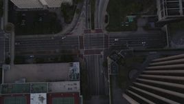 5K aerial stock footage bird's eye of Flower Street in Downtown Los Angeles at twilight, California Aerial Stock Footage | DCLA_250