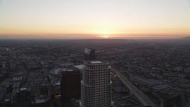 5K aerial stock footage fly over Downtown Los Angeles toward setting sun in California Aerial Stock Footage | DCLA_253
