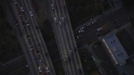 5K aerial stock footage bird's eye view of light traffic on Highway 101 in Hollywood at twilight, California Aerial Stock Footage | DCLA_270