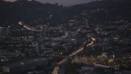 5K aerial stock footage tilt along Highway 101 with heavy traffic Hollywood, California, twilight Aerial Stock Footage | DCLA_273