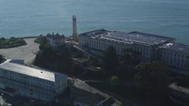 5K aerial stock footage Flying by main building, apartments, and lighthouse of Alcatraz, San Francisco, California Aerial Stock Footage | DCSF05_028