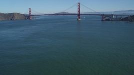 5K aerial stock footage Tilt from San Francisco Bay to reveal and approach the Golden Gate Bridge, San Francisco, California Aerial Stock Footage | DCSF05_038