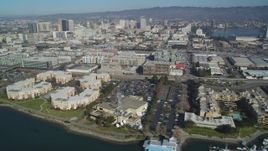 5K aerial stock footage Flyby waterfront apartment buildings, marinas, KTVU Television/FOX 2 building, Oakland, California Aerial Stock Footage | DCSF05_081