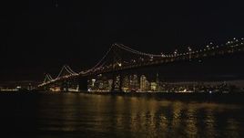 5K aerial stock footage Approach and fly over Bay Bridge, approach Downtown San Francisco skyline, California, night Aerial Stock Footage | DCSF06_002