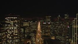 5K aerial stock footage Follow Market Street between skyscrapers, Downtown San Francisco, California, night Aerial Stock Footage | DCSF06_005