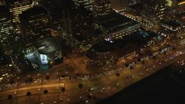 5K aerial stock footage Tilt from The Embarcadero, reveal and fly over skyscrapers, Downtown San Francisco, California, night Aerial Stock Footage | DCSF06_015