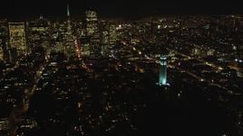 5K aerial stock footage Flying by Coit Tower with a view of Transamerica Pyramid, San Francisco, California, night Aerial Stock Footage | DCSF06_025
