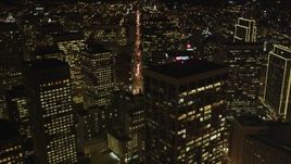 5K aerial stock footage Tilt from The Embarcadero, reveal Downtown San Francisco skyscrapers, California, night Aerial Stock Footage | DCSF06_037