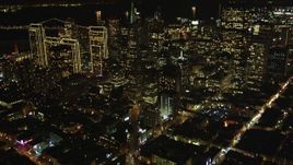 5K aerial stock footage Tilt up Columbus Avenue to reveal Transamerica Pyramid and skyscrapers, Downtown San Francisco, California, night Aerial Stock Footage | DCSF06_065