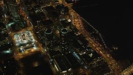 5K aerial stock footage Orbit Infinity Towers condominiums, tilt to reveal Downtown San Francisco, California, night Aerial Stock Footage | DCSF06_069