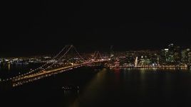 5K aerial stock footage Flying away from the Bay Bridge, San Francisco, California, night Aerial Stock Footage | DCSF06_085
