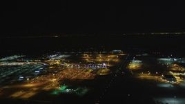 5K aerial stock footage Flyby Oakland International Airport and the FedEx Terminal, Oakland, California, night Aerial Stock Footage | DCSF06_104