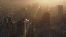 5K aerial stock footage Follow Market Street through downtown with a hazy sunset, Downtown San Francisco, California Aerial Stock Footage | DCSF07_017