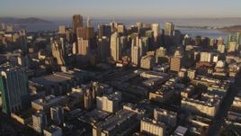 5K aerial stock footage Tilt from I-80 to reveal and approach downtown skyscrapers, Downtown San Francisco, California, sunset Aerial Stock Footage | DCSF07_025