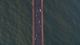 5K aerial stock footage Bird's eye view of cars on the Golden Gate Bridge, San Francisco, California, sunset Aerial Stock Footage | DCSF07_041