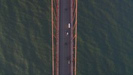 5K aerial stock footage Bird's eye view of light traffic on the Golden Gate Bridge, San Francisco, California, sunset Aerial Stock Footage | DCSF07_042