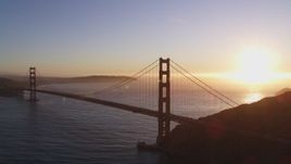 5K aerial stock footage Reverse view of the Golden Gate Bridge, San Francisco, California, sunset Aerial Stock Footage | DCSF07_043