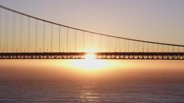 5K aerial stock footage Flying by the south end of the Golden Gate Bridge, San Francisco, California, sunset Aerial Stock Footage | DCSF07_050