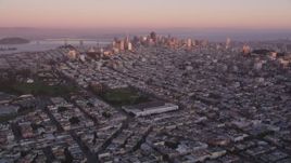 5K Aerial Video Approach Marina Middle School and baseball fields, downtown in the background, San Francisco, California, twilight Aerial Stock Footage | DCSF07_056