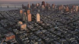 5K Aerial Video Tilt from Russian Hill apartment buildings to reveal Downtown San Francisco, California, twilight Aerial Stock Footage | DCSF07_057