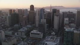 5K Aerial Video Flying by skyscrapers, Downtown San Francisco, California, sunset Aerial Stock Footage | DCSF07_061